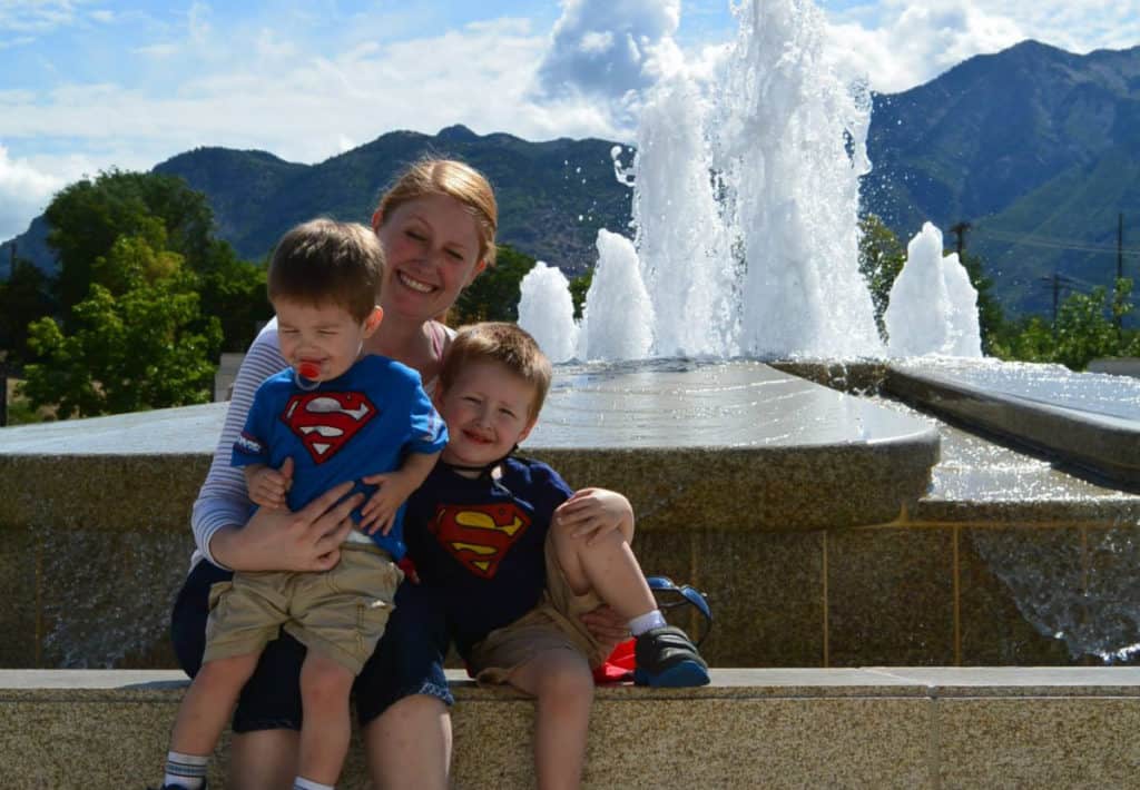 An image of Kimberly and two of her kids in front of the fountain at Ogden, Utah, USA temple.